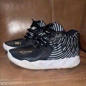 Puma Kids Black and White Striped Sneakers